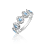 Blue topaz and diamond ring in gold